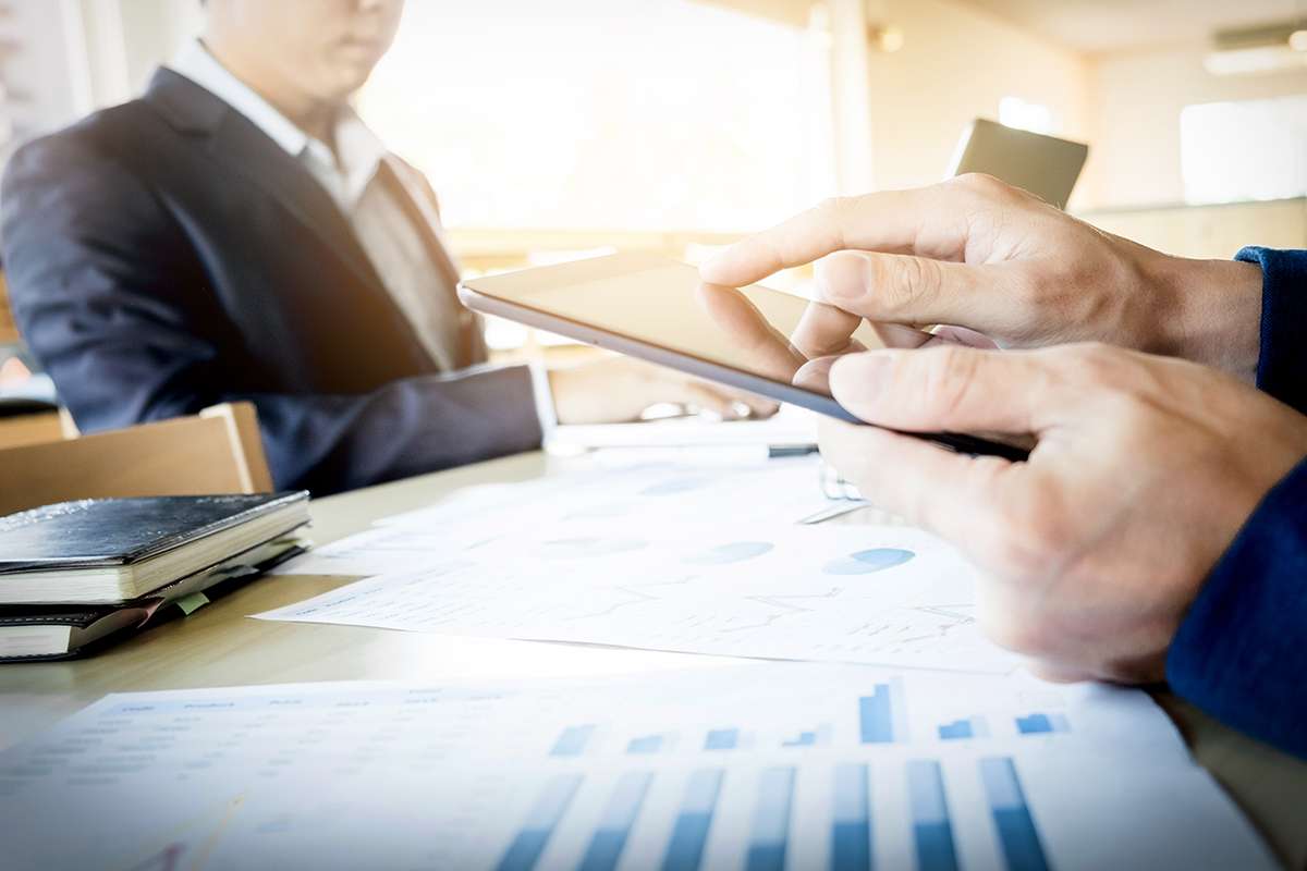 businessman working with digital tablet computer and smart phone and laptop.